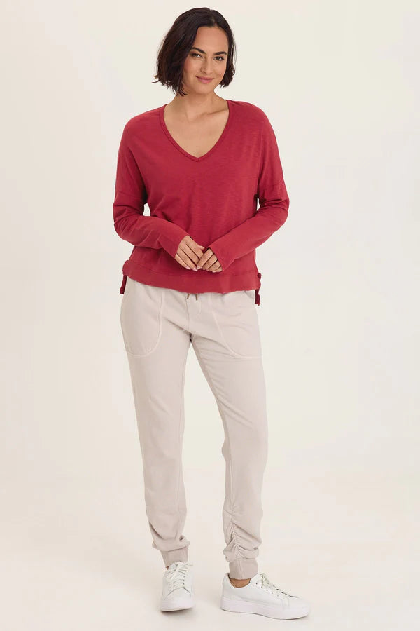 XCVI Wearables Odilia High-Low Long Sleeve V-Neck Top  in Corundum