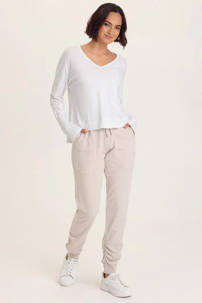 XCVI Wearables Odilia High-Low Long Sleeve V-Neck Top  in White