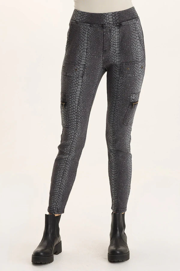 Patterned leggings worn by a person on a white background