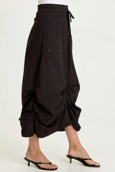 XCVI Wearables Hedvig Poplin Pleated Hem Skirt  in Black