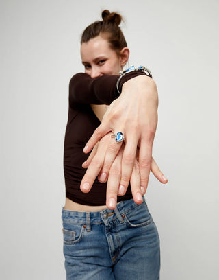 UNOde50 Ring with blue oval faceted crystal