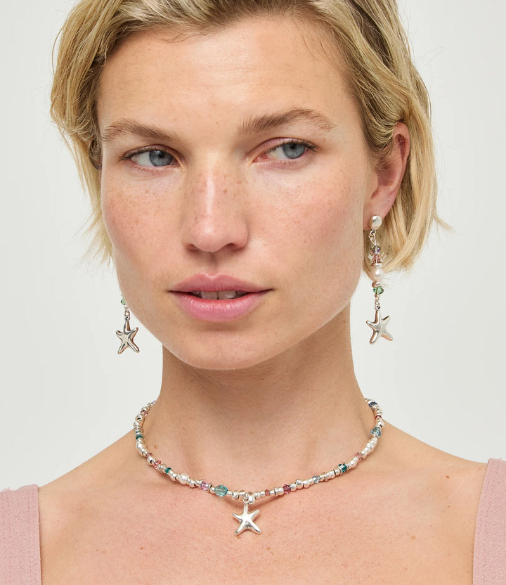 UNOde50  Earrings Espectro Long earrings with starfish and pearl Silver