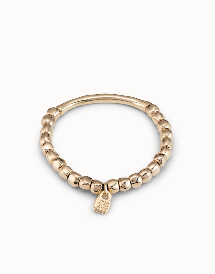 UNOde50 Beaded stretch bracelet with tubular piece- Gold