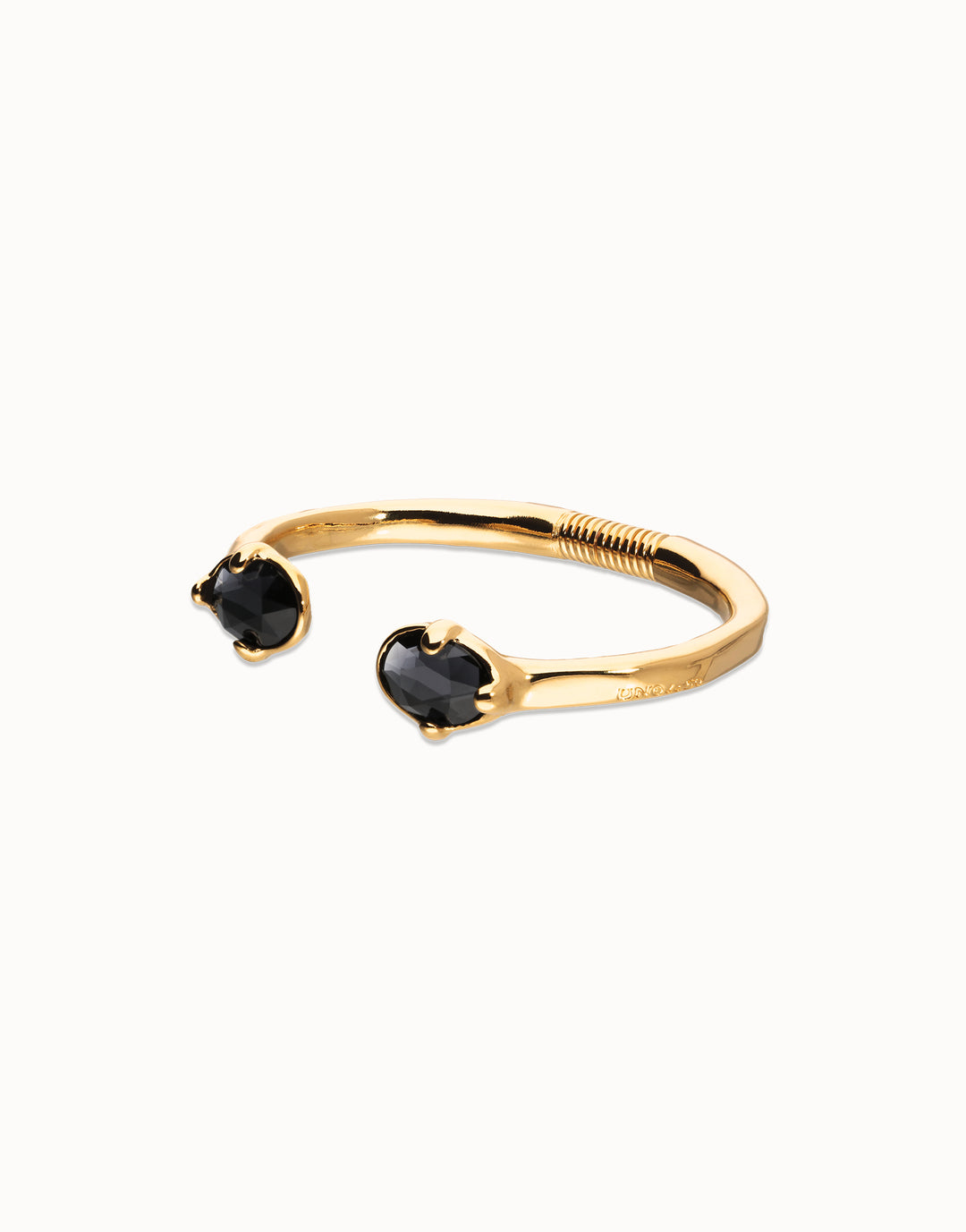 UNODE50 Bangle bracelet with two faceted black oval crystals - Gold